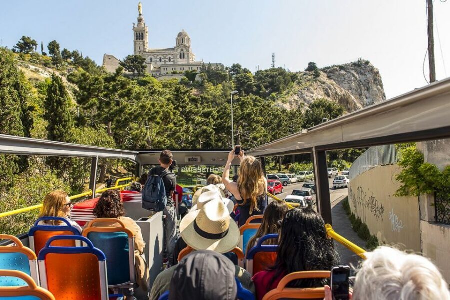 Marseille: City Sightseeing Hop-On Hop-Off Bus Tour - Practical Comfort Rules: Headphones, No Food, and Narrow Streets
