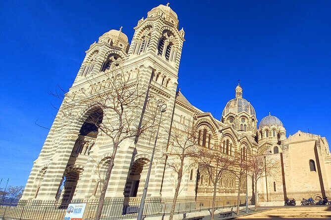 Marseille Guided Tour for 4 Hours with a Bilingual Local Guide - Canebière: Marseille’s main street, plus the port story behind it