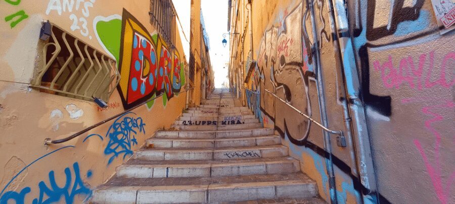 Marseille: Half-Day City Highlights Guided Walking Tour - Old Port, a short ferry ride, and the waterfront rhythm