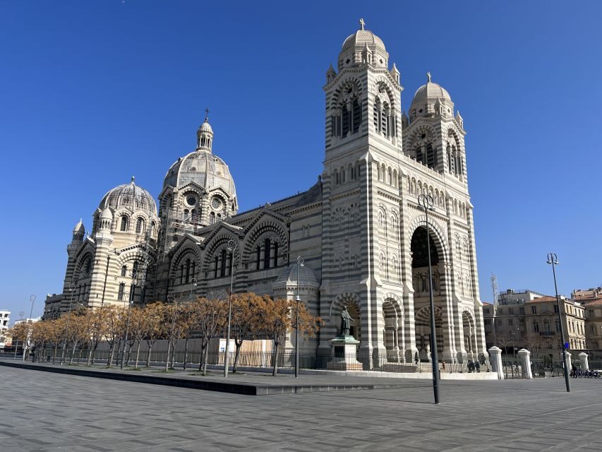 Marseille: Sightseeing E-Bike Tour - Notre-Dame de la Garde: the hilltop payoff and optional basilica time